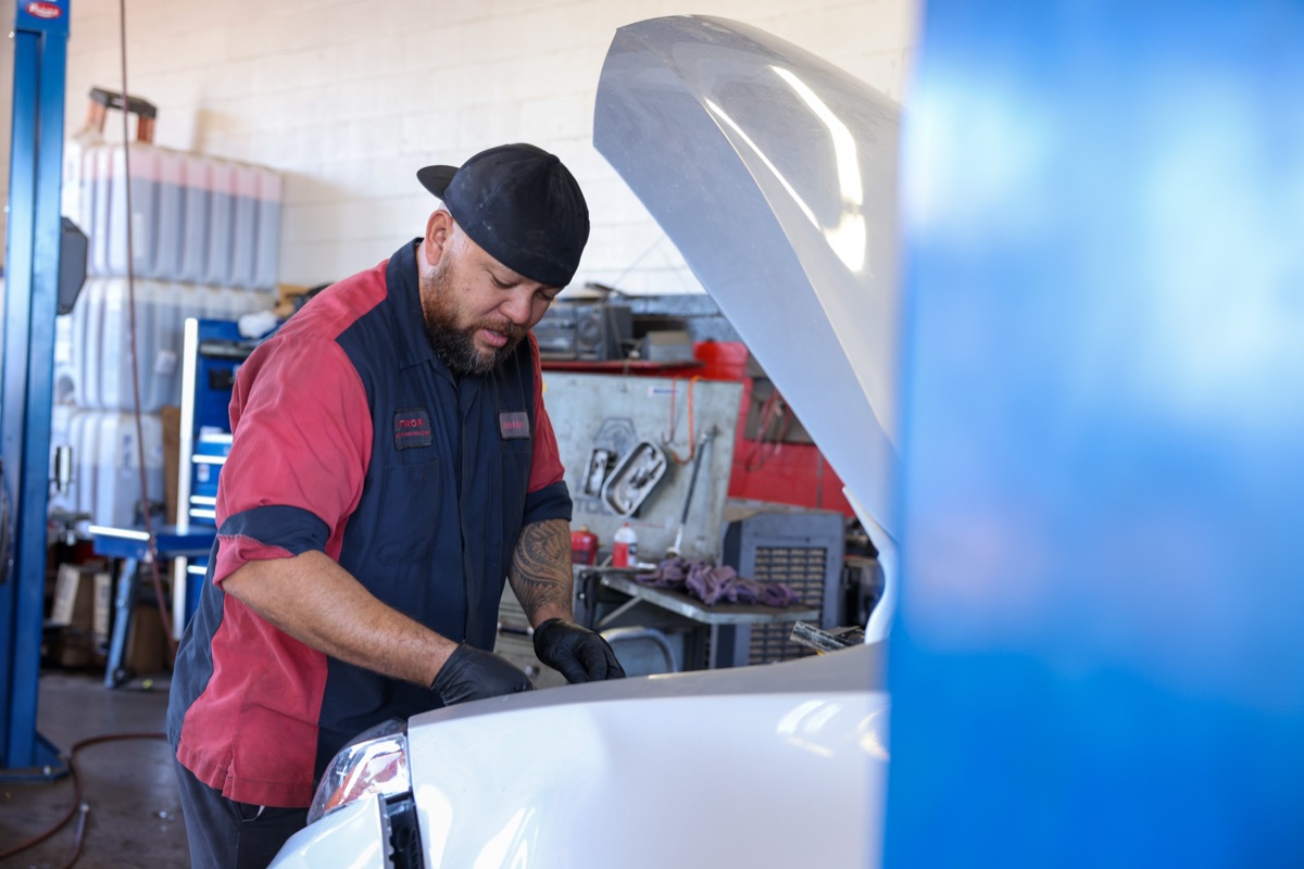Network Automotive technician at work